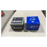 2 SPIN REELS INC DIAWA & OKUMA IN BOX