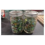 2 JARS OF MARBLES