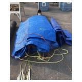 GROUP OF BLUE TARPS