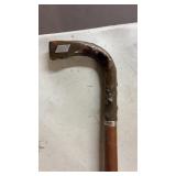 VINTAGE CANE W/WOOD HANDLE SMALL CRACK & ?