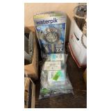 NEW WATERPIK SHOWER HEAD & KIRKLAND SOAP