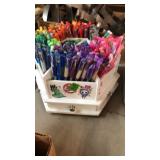REVOLVING CADDY OF PENS