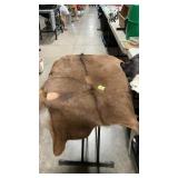 TWO ASSORTED GOAT HIDES