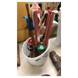 BUCKET OF ICE FISHING POLES