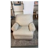 UPHOLSTERED SWIVEL ROCKING CHAIR
