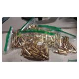 4 BAGS OF .243 WIN BRASS AND 12 ROUNDS OF 243 WIN