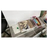 FIREARMS GUIDE BOOK AND 2 PACKS OF CLEANING PADS