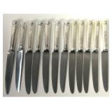 12 ENGLISH STERLING HANDLED FEATHER EDGE KNIVES