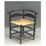 LATE 18THC. CORNER CHAIR IN OLD BLACK
