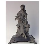 SPELTER SCULPTURE OF A YOUNG MUSICIAN, 17 1/2