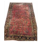 C. 1920 ROOM SIZE SAROUK CARPET , DMG ON ONE END