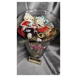 Costume jewelry in large vase