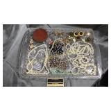 Tray of costume jewelry and compact, ear bobs