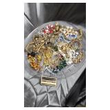 Round tray of costume jewelry