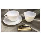 Opalescent  up and saucer with extra cup has