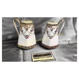 Pair of hand painted shakers