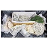 Basket full of hand done doilies and tatting