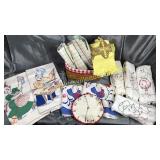 Basket of vintage kitchen linens and embroidery