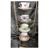 4 cups and saucers stand not included