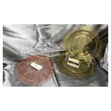 2 yellow depression plates and pink cake stand