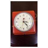 Vintage red GE kitchen wall clock