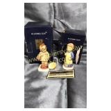 Pair of Hummel figurines with boxes
