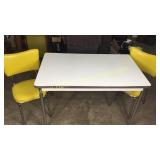 Retro style chrome dinette set with yellow chairs
