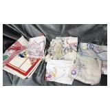 Tray of hand made linens and vintage kitchen