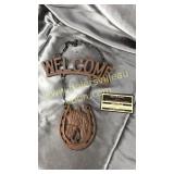 Cast iron hanging welcome sign