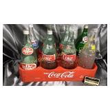 8 pack of various soda bottles