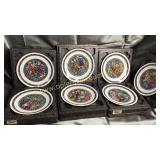 Set of 7 Limoges Christmas plates