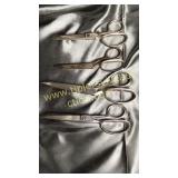 4 pair of old Winchester scissors