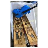 Box with tall wood carvings and blue violin