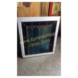 Gorgeous antique stain glass window in chippy