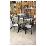 Metal dinette set with glass top