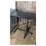 Adjustable bed side table