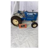 Vintage metal Ford tractor toy