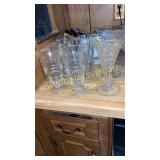 6 sundae glasses and 2 vases