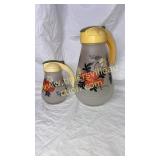 Vintage matching syrup and batter pitchers