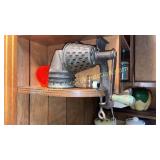 Vintage kitchen grader with green handle and