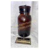 Old brown lightning fruit jar has been repaired