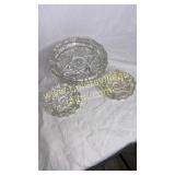 3 starburst ashtrays- one of the smaller has