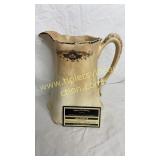 Old floral pitcher