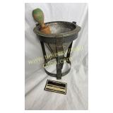 Vintage juice strainer with green handle masher