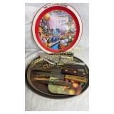 Old knives and pie servers with metal Coca-Cola