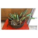 Group of green wood handle kitchen utensils