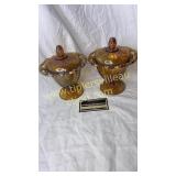 Pair of amber carnival candy stands