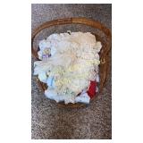 Doilies and needlework in large basket