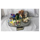 Figurines and collectibles on cristal platter