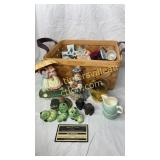 Figurines and trinkets in basket